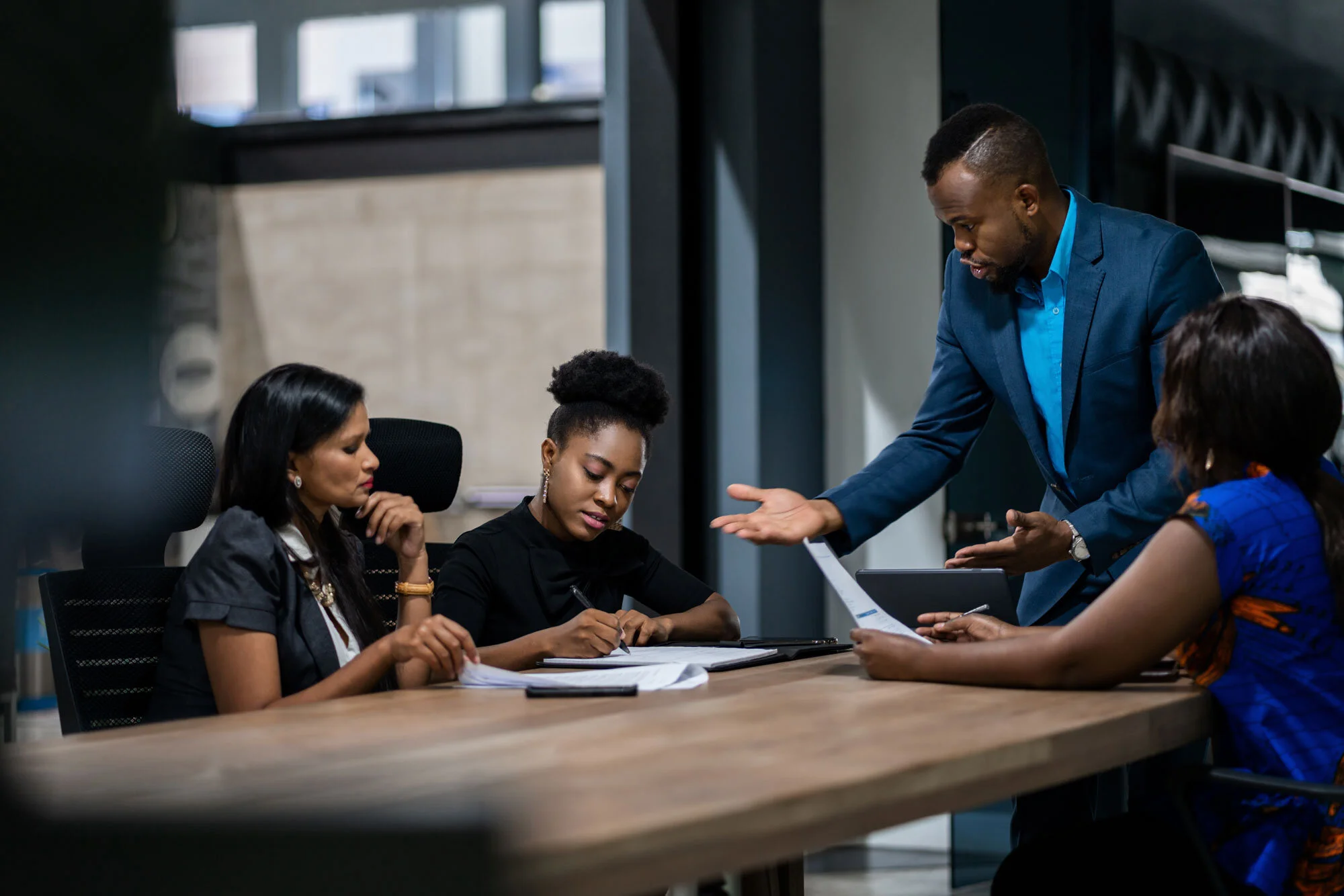 Team working with clients